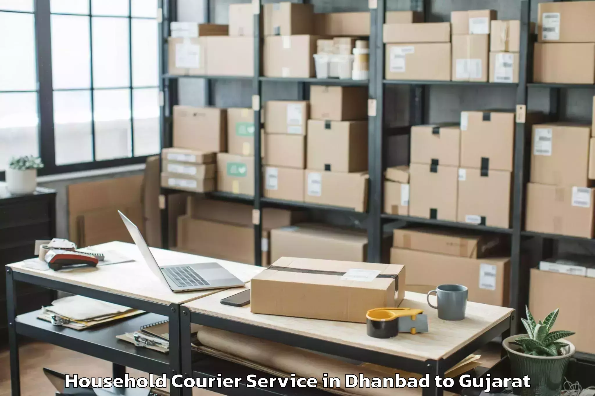 Book Dhanbad to Mehmedabad Household Courier Online